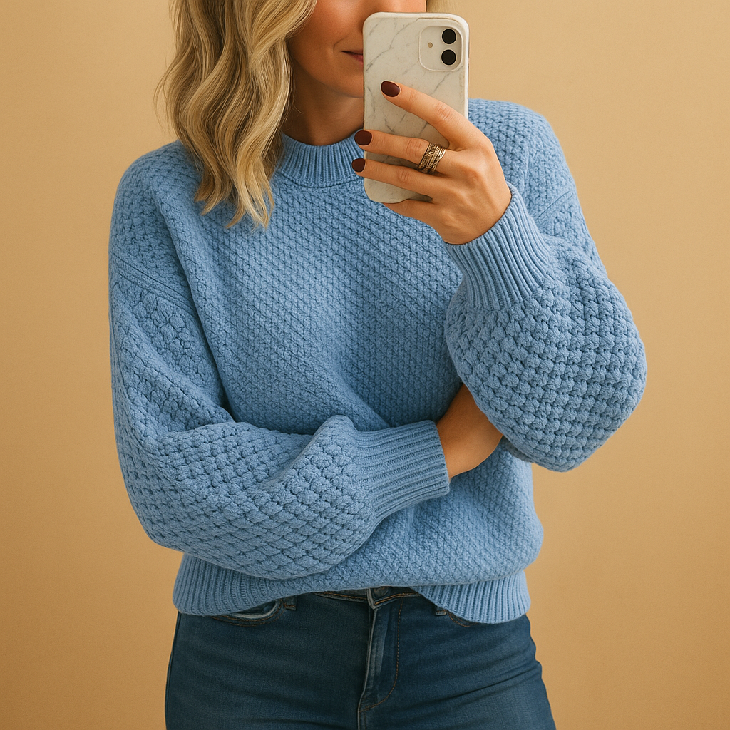 Women’s elegant knitted sweater with classic fit, warm lightweight fabric, and versatile design. Perfect for casual or formal winter outfits.