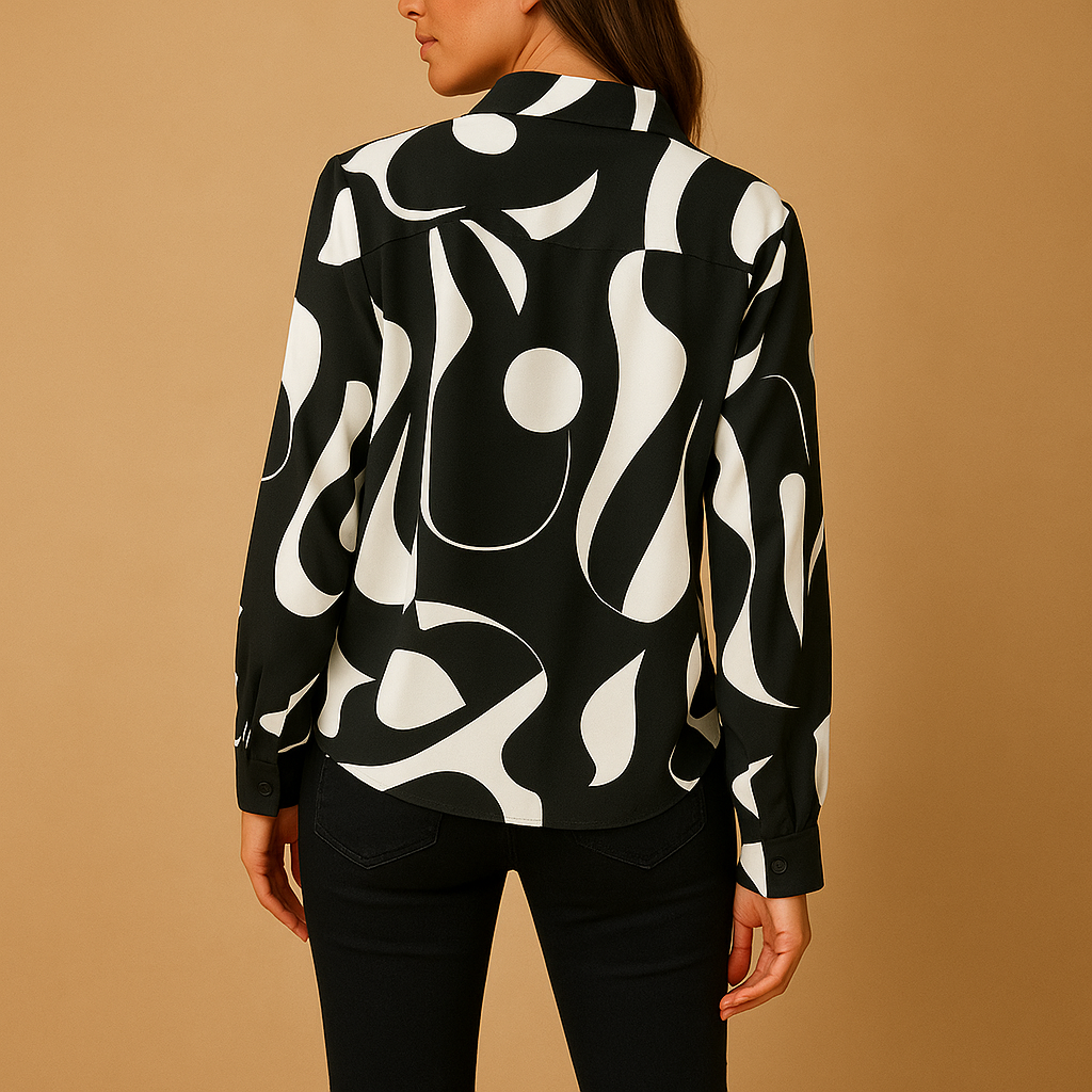 Elegant printed blouse for women in apricot and black with a refined print, perfect for both casual and formal occasions.