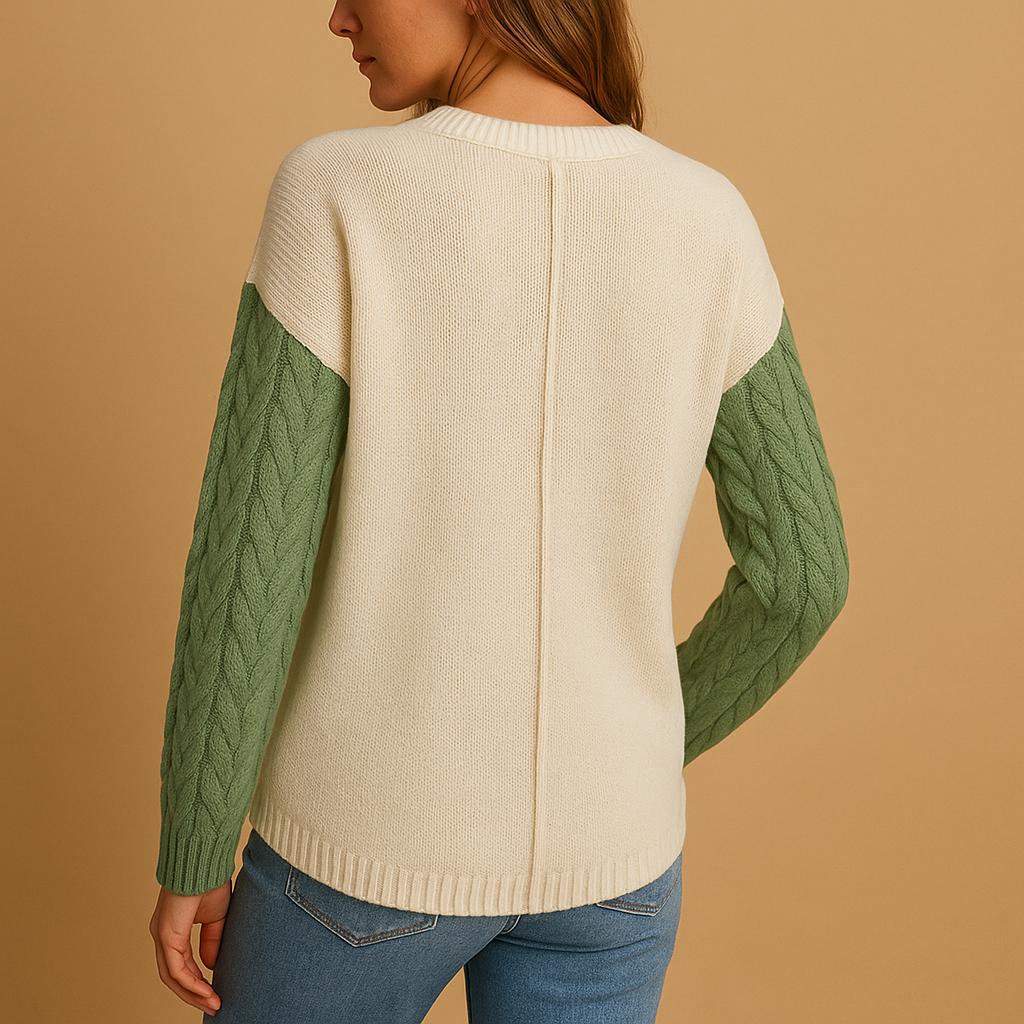 Women’s knitted sweater with cable pattern, relaxed fit, dropped shoulders, and pocket detail. Perfect for casual outfits, layering, or cozy days at home.
