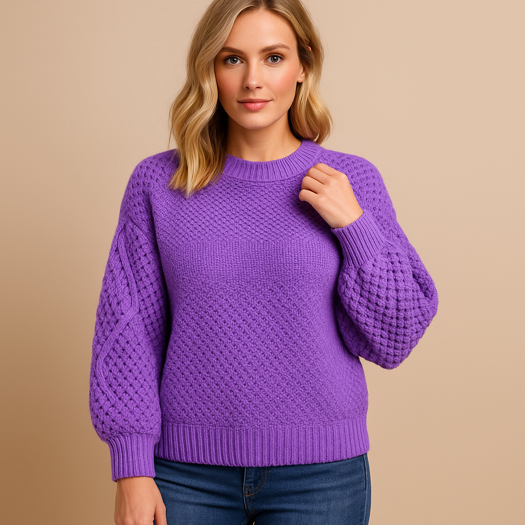 Women’s knitted winter sweater with tailored relaxed fit, soft lightweight fabric, and minimalist design in neutral winter tones for stylish wear.