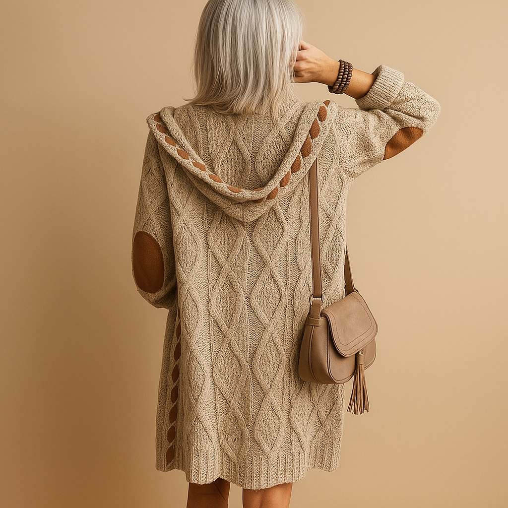 Women’s lightweight knitted cardigan with hood in neutral tones, perfect for layering on cool summer evenings or during transitional weather.