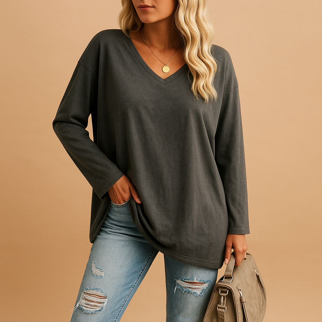 Women’s lightweight summer top with round neck and short sleeves, designed for comfort and effortless warm-weather style.