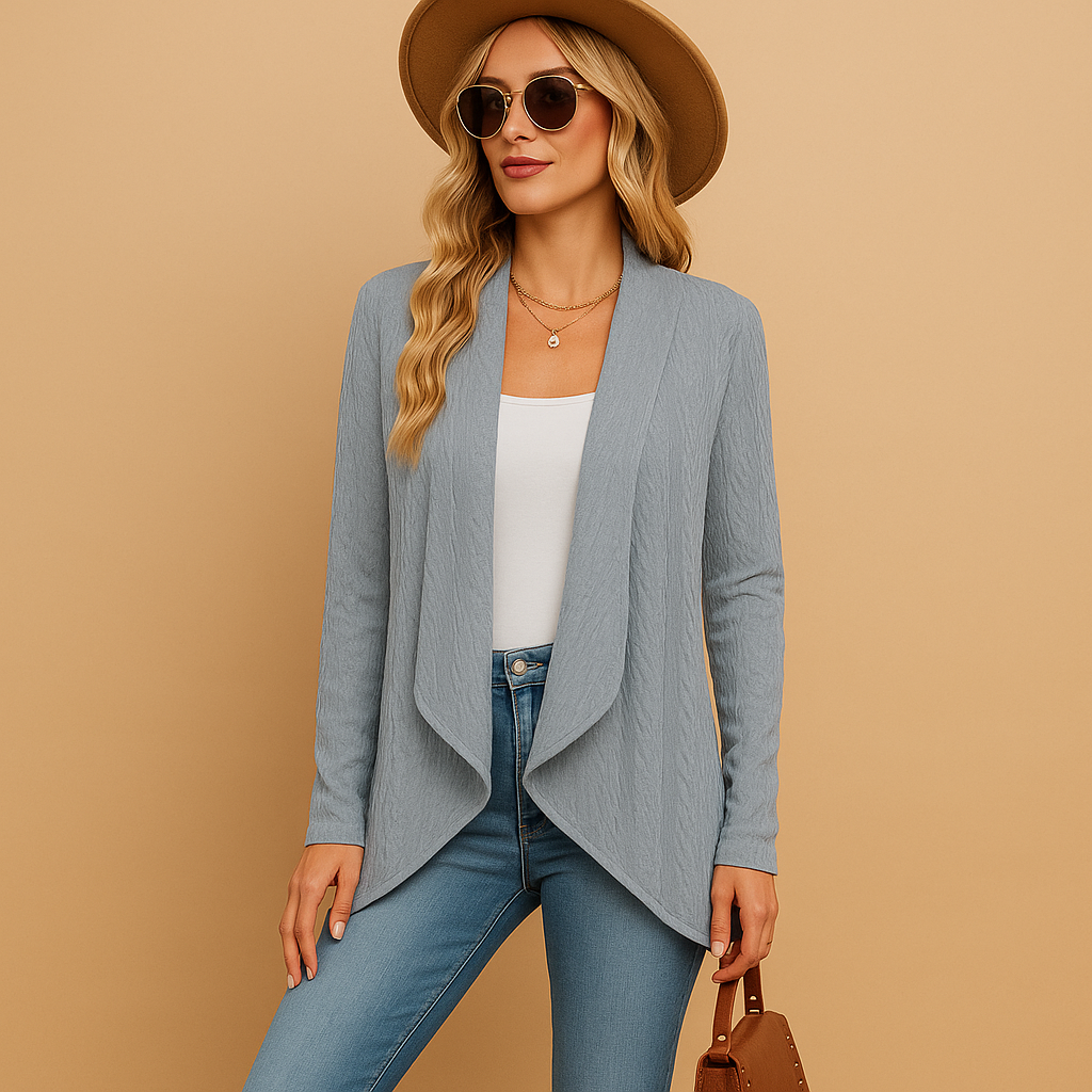 Women’s long knitted cardigan with soft texture and relaxed fit. Elegant layering piece in solid colors, ideal for work, casual outfits, and seasonal wear.