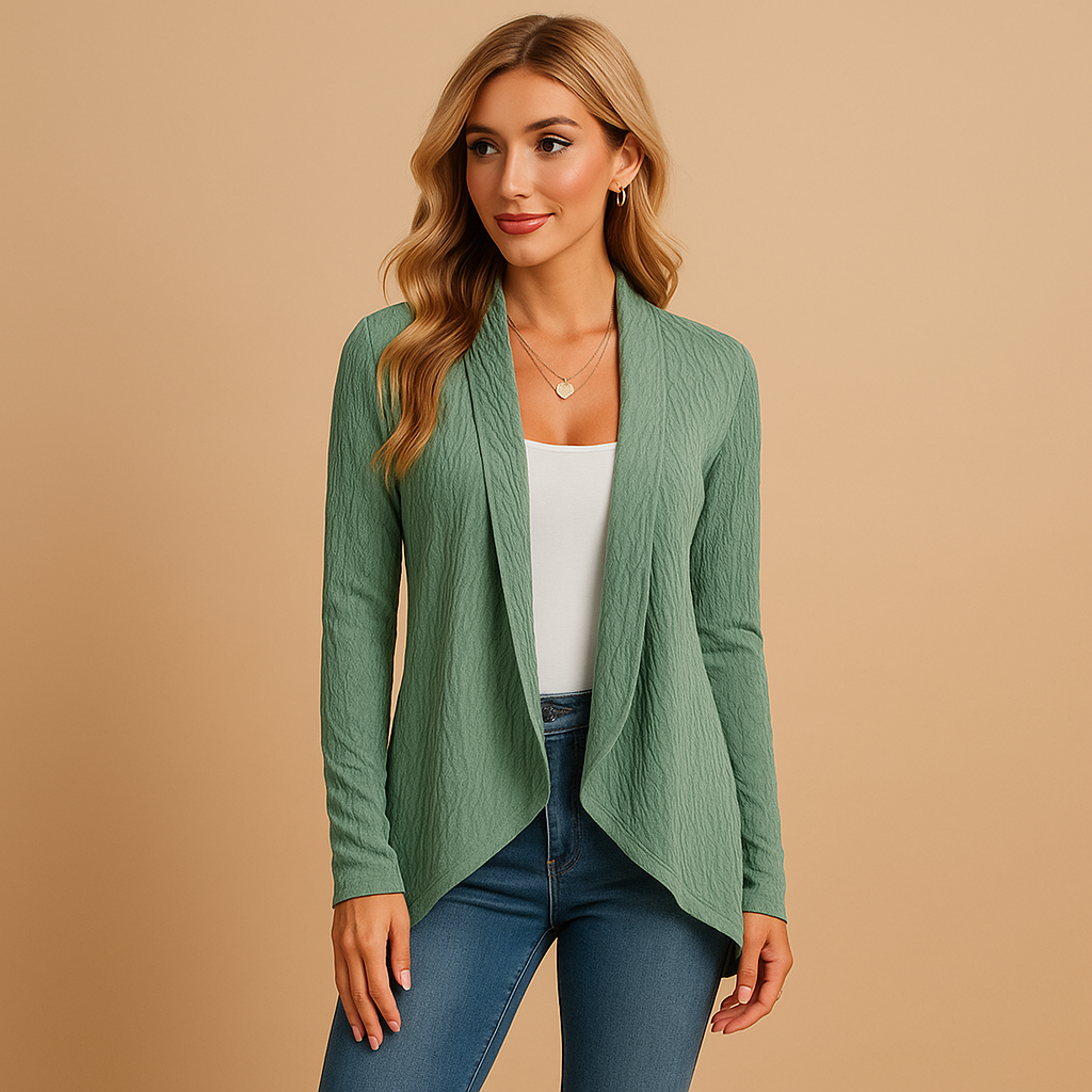 Women’s long knitted cardigan with soft texture and relaxed fit. Elegant layering piece in solid colors, ideal for work, casual outfits, and seasonal wear.