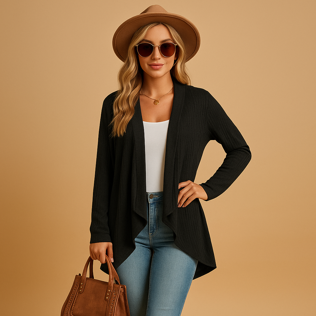 Women’s long knitted cardigan with soft texture and relaxed fit. Elegant layering piece in solid colors, ideal for work, casual outfits, and seasonal wear.