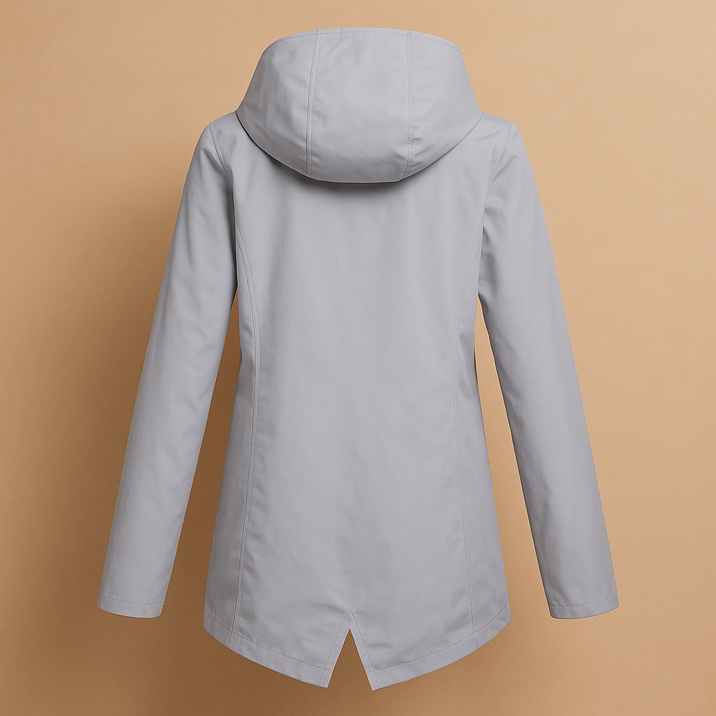 Women’s long waterproof raincoat with hood, breathable fabric, and stylish design. Ideal for commuting, walks, and everyday use on rainy days.