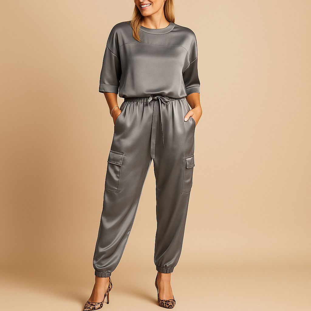 Elegant satin two-piece set for women with half-sleeve top and straight-leg pants, perfect for formal events or relaxed evenings.