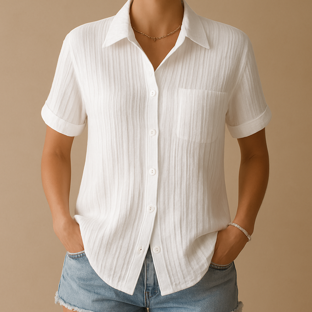 Classic short sleeve blouse for women in white with a relaxed fit and chest pocket, perfect for casual and formal outfits.