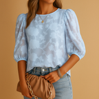Elegant floral blouse for women with refined print and flattering silhouette, perfect for casual days or formal occasions.