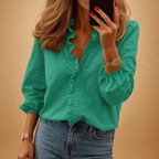 Elegant ruffle blouse for women with lightweight fabric and flattering fit, perfect for both formal and casual occasions.