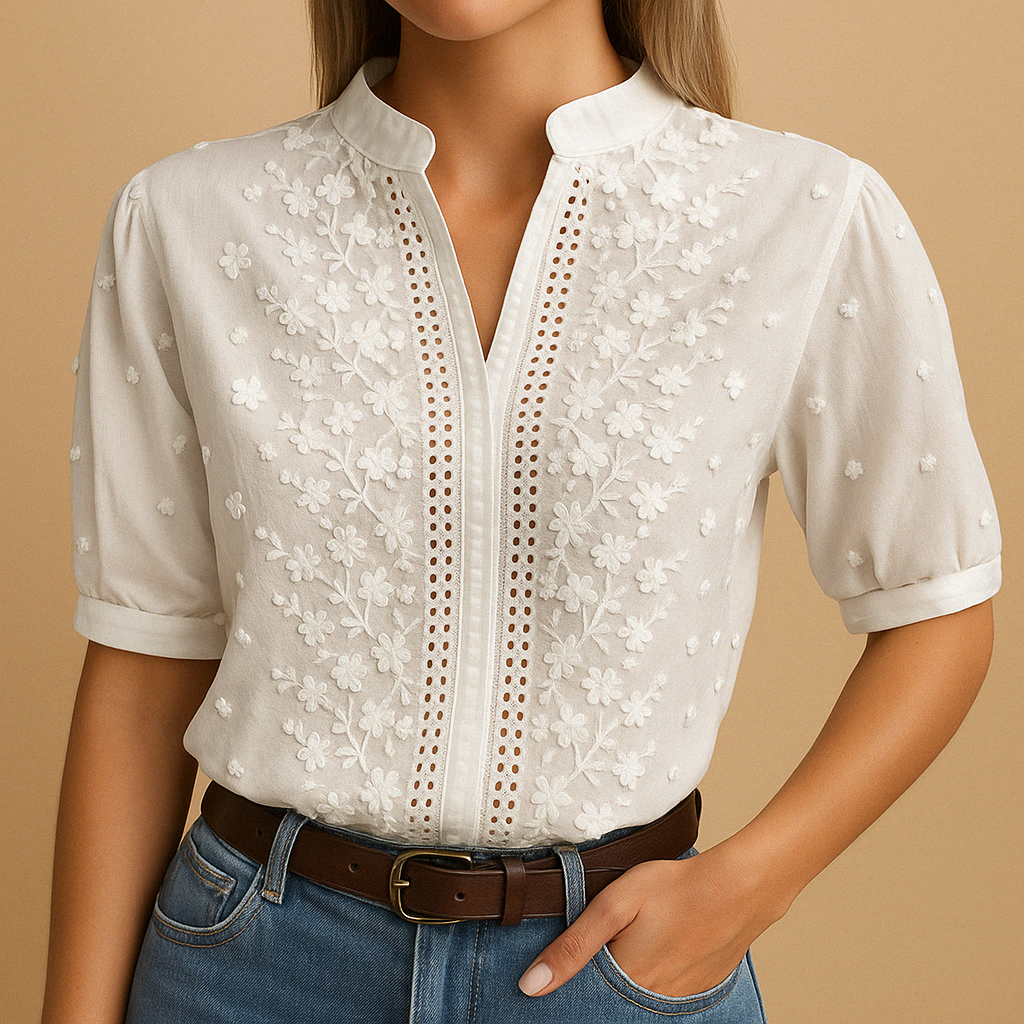 Elegant white blouse for women with classic collar and button closure, perfect for work, leisure, or stylish everyday wear.