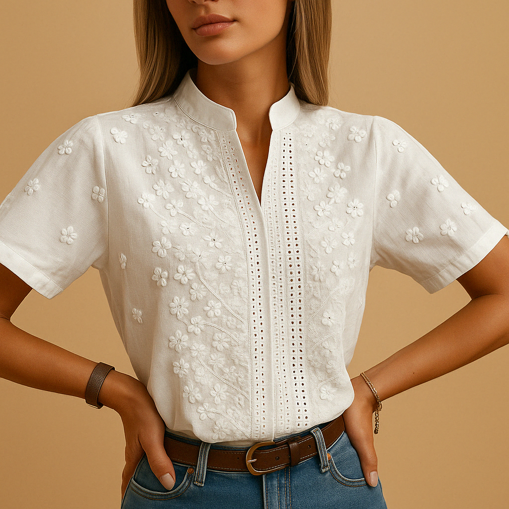 Elegant white blouse for women with classic collar and button closure, perfect for work, leisure, or stylish everyday wear.