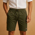 Men’s breathable sport shorts with elastic waistband and multiple pockets, available in black, green, gray, beige, and blue for versatile use.