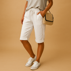 Women’s casual capri pants with relaxed fit, elastic waist and drawstring, rolled-up hem. Airy and stylish for spring and summer outfits.
