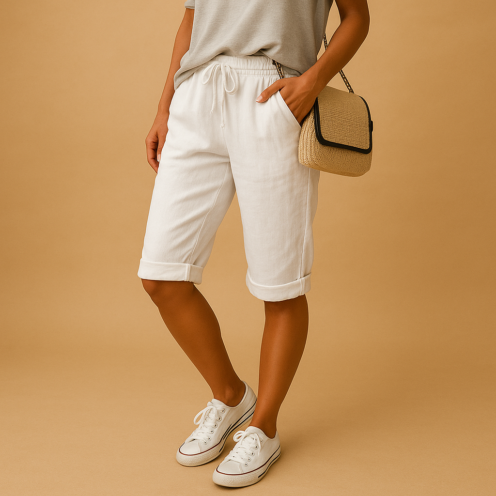 Women’s casual capri pants with relaxed fit, elastic waist and drawstring, rolled-up hem. Airy and stylish for spring and summer outfits.