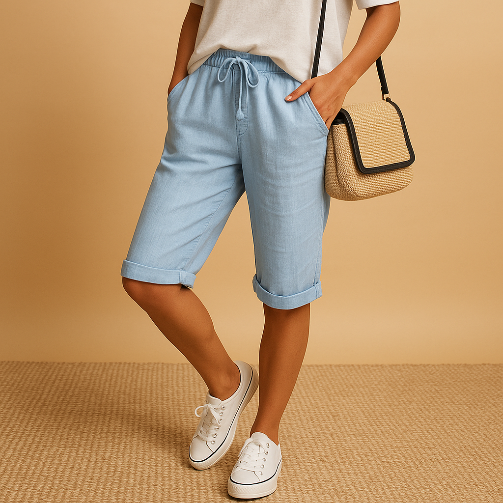 Women’s casual capri pants with relaxed fit, elastic waist and drawstring, rolled-up hem. Airy and stylish for spring and summer outfits.