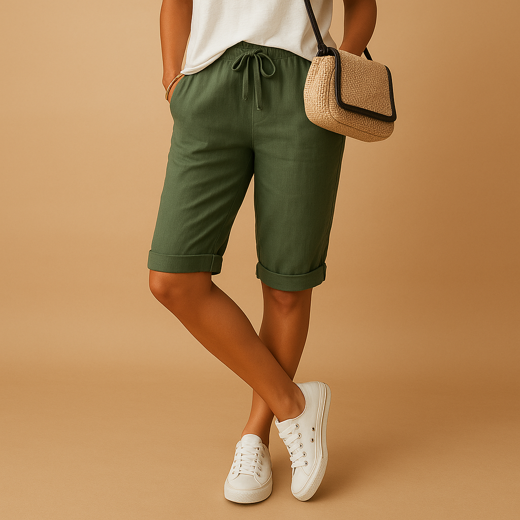 Women’s casual capri pants with relaxed fit, elastic waist and drawstring, rolled-up hem. Airy and stylish for spring and summer outfits.