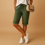 Women’s casual capri pants with relaxed fit, elastic waist and drawstring, rolled-up hem. Airy and stylish for spring and summer outfits.