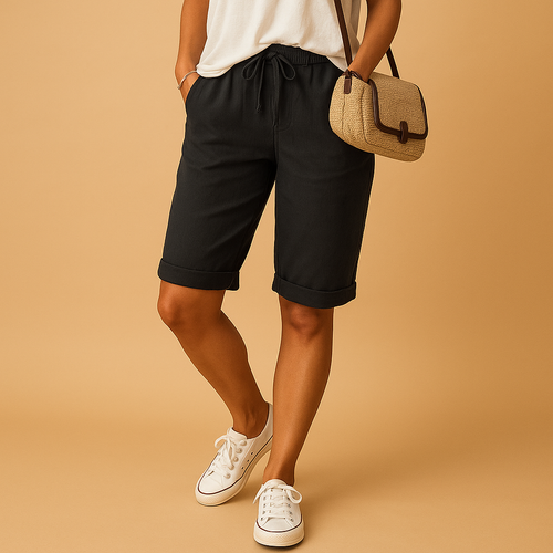 Women’s casual capri pants with relaxed fit, elastic waist and drawstring, rolled-up hem. Airy and stylish for spring and summer outfits.