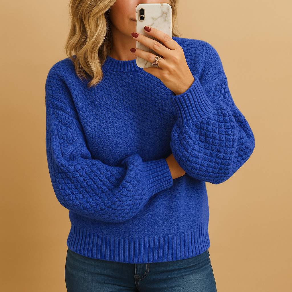 Women’s elegant knitted sweater with classic fit, warm lightweight fabric, and versatile design. Perfect for casual or formal winter outfits.