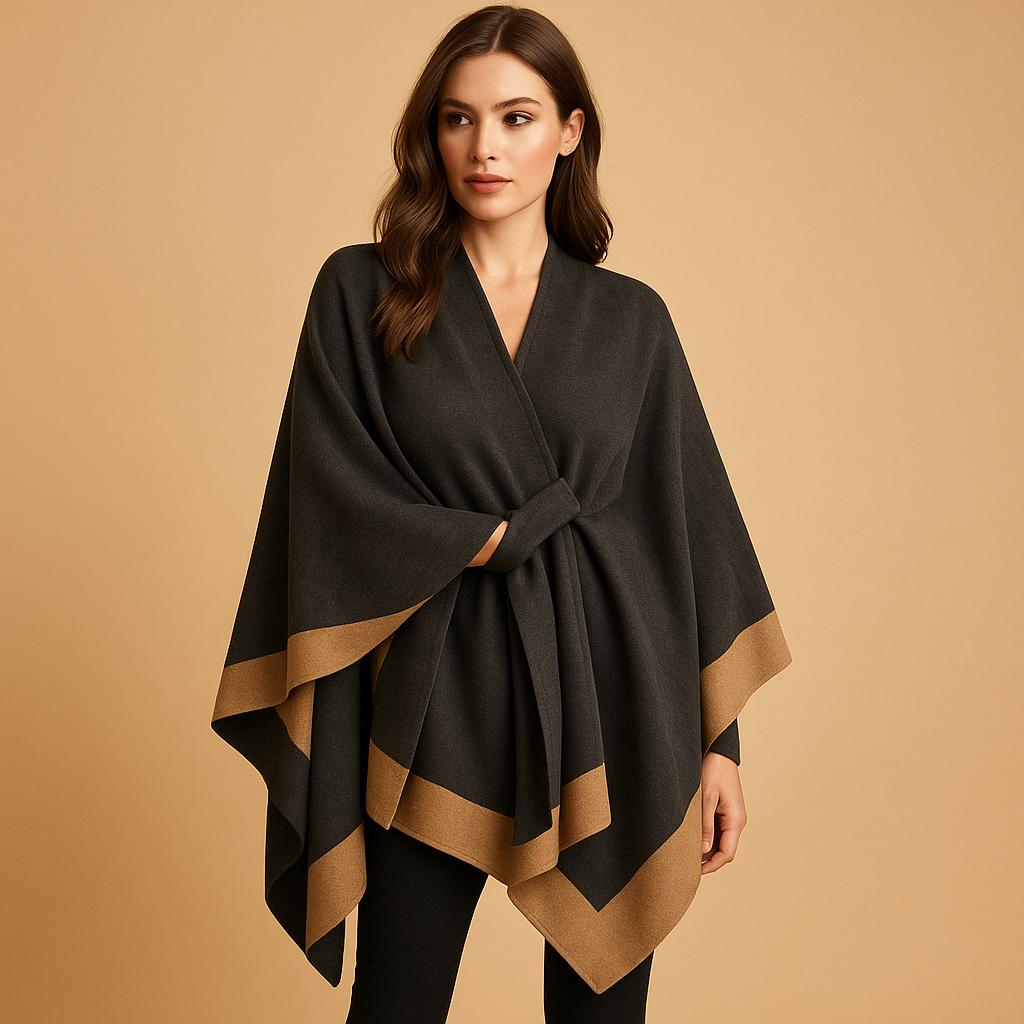 Women’s elegant poncho with flowing silhouette, open sides, and soft faux cashmere fabric. Ideal for autumn and winter layered outfits.