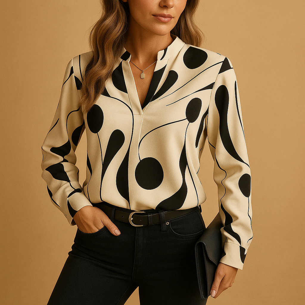 Elegant printed blouse for women in apricot and black with a refined print, perfect for both casual and formal occasions.