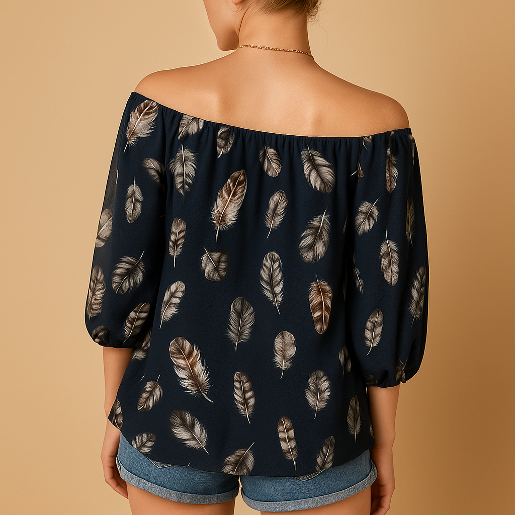 Women’s feather print V-neck blouse with loose fit and breathable cotton blend, perfect for warm days and casual wear.