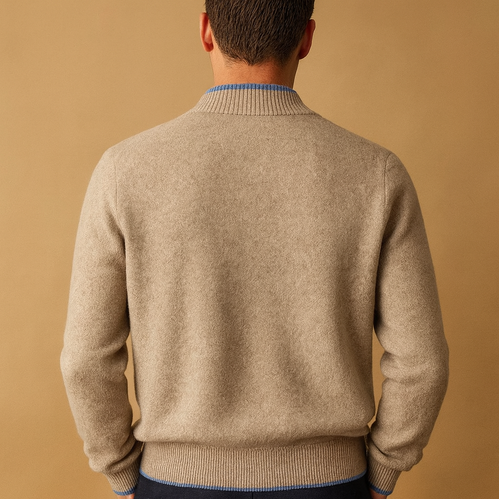 Men’s half-zip sweater with ribbed sleeves and a modern pattern, designed for warmth and everyday smart-casual autumn and winter outfits.