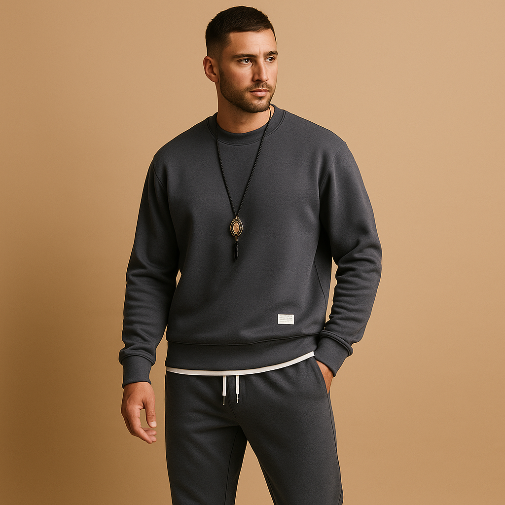 Modern men’s tracksuit with matching sweater and jogging jeans, perfect for leisure, casual wear, or light daily activities.