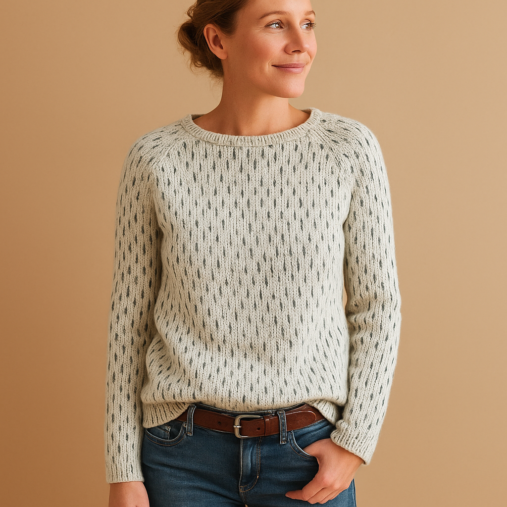 Women’s knitted grey winter sweater with relaxed fit, breathable knit fabric, and elegant texture, perfect for layering in casual or formal looks.