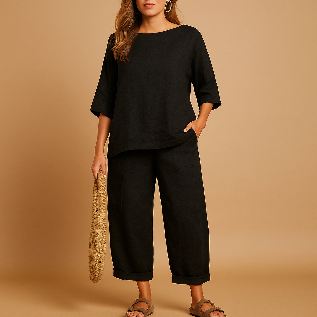 Women’s light two-piece summer set with relaxed shirt and ankle-length pants, perfect for warm days, casual wear, or lounging at home.