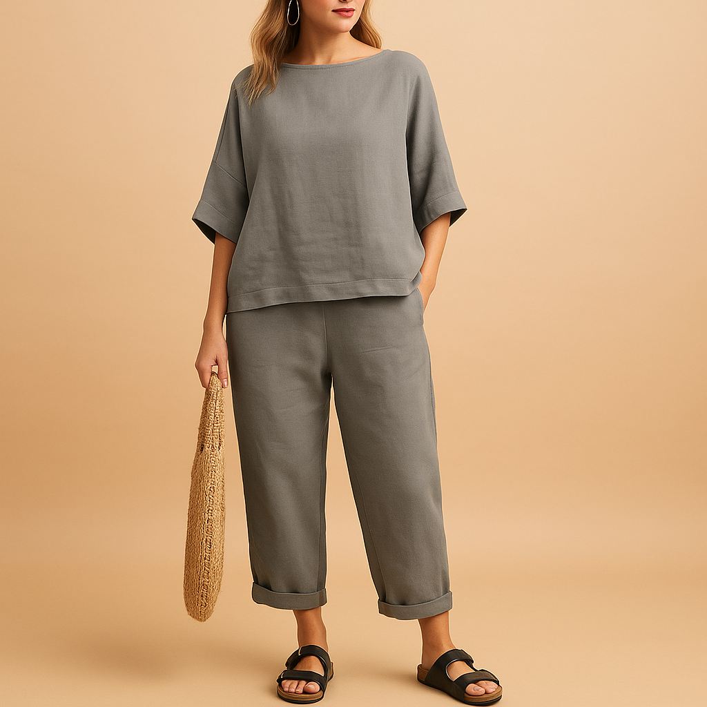 Women’s light two-piece summer set with relaxed shirt and ankle-length pants, perfect for warm days, casual wear, or lounging at home.