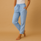 Women’s lightweight elegant pants with elastic waistband and feminine cut, flowing fabric perfect for casual or formal occasions.