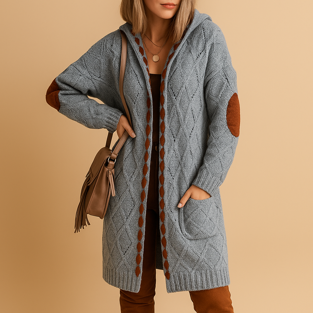 Women’s lightweight knitted cardigan with hood in neutral tones, perfect for layering on cool summer evenings or during transitional weather.