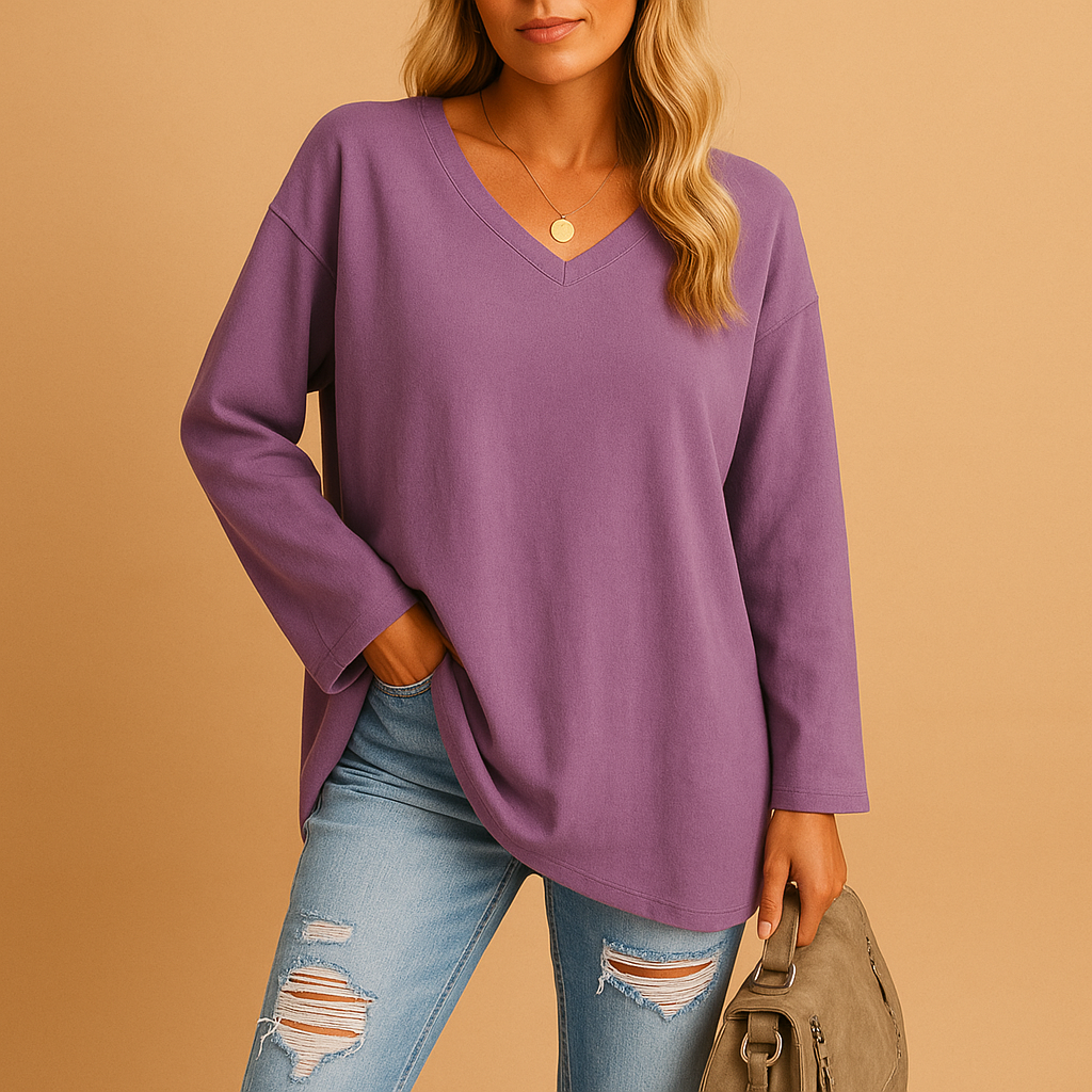 Women’s lightweight summer top with round neck and short sleeves, designed for comfort and effortless warm-weather style.