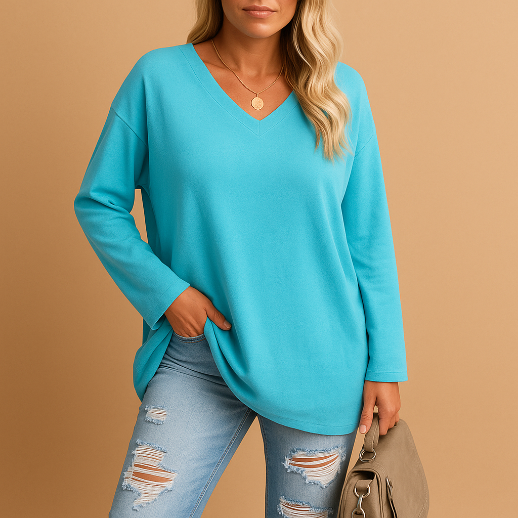 Women’s lightweight summer top with round neck and short sleeves, designed for comfort and effortless warm-weather style.