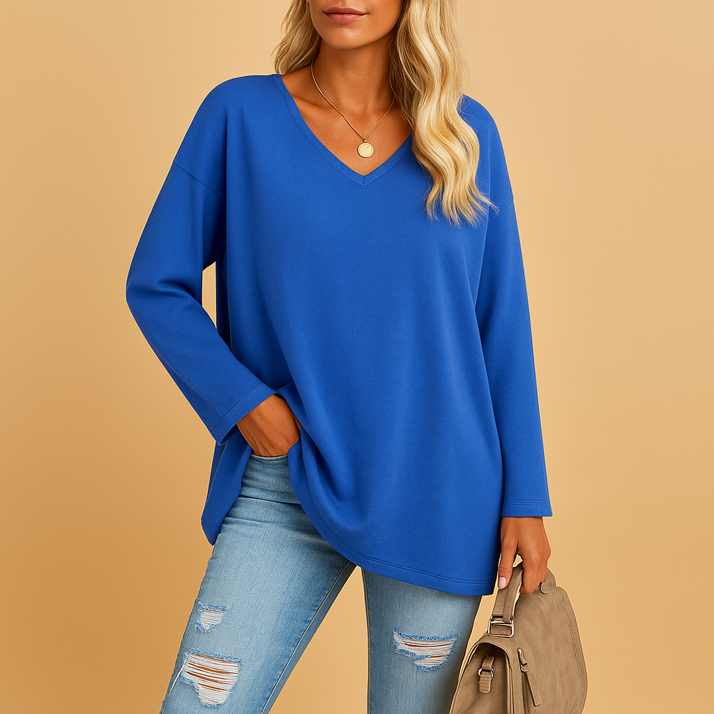 Women’s lightweight summer top with round neck and short sleeves, designed for comfort and effortless warm-weather style.