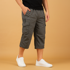 Men’s long cargo shorts made from breathable cotton with multiple pockets, available in gray, khaki, green, black, and navy for summer wear.