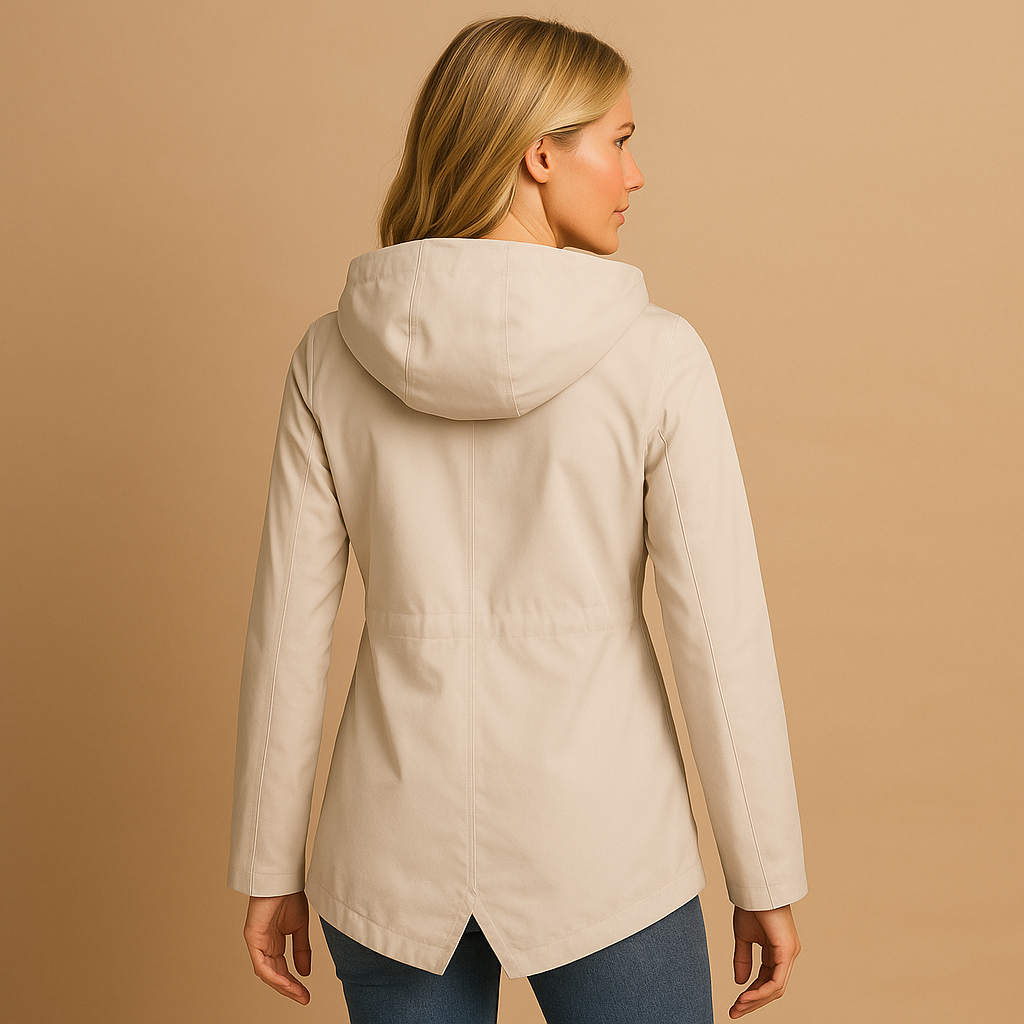 Women’s long waterproof raincoat with hood, breathable fabric, and stylish design. Ideal for commuting, walks, and everyday use on rainy days.