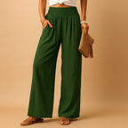 Women’s loose summer pants with elastic waistband and wide legs, breathable and lightweight fabric, ideal for warm casual days.