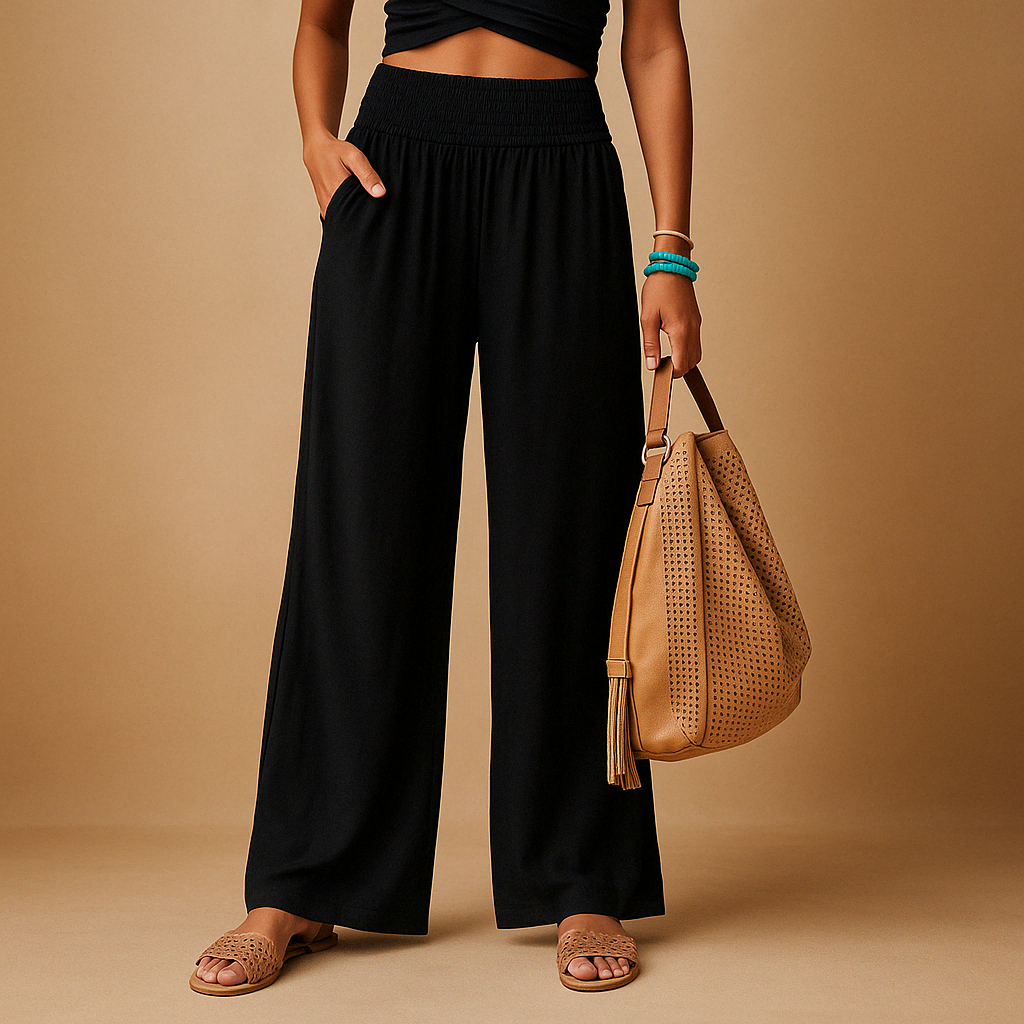 Women’s loose summer pants with elastic waistband and wide legs, breathable and lightweight fabric, ideal for warm casual days.
