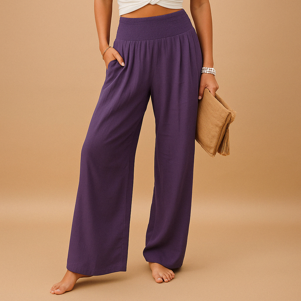 Women’s loose summer pants with elastic waistband and wide legs, breathable and lightweight fabric, ideal for warm casual days.