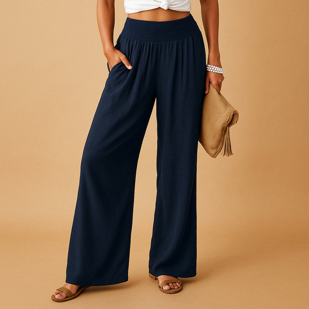 Women’s loose summer pants with elastic waistband and wide legs, breathable and lightweight fabric, ideal for warm casual days.