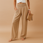 Women’s loose summer pants with elastic waistband and wide legs, breathable and lightweight fabric, ideal for warm casual days.