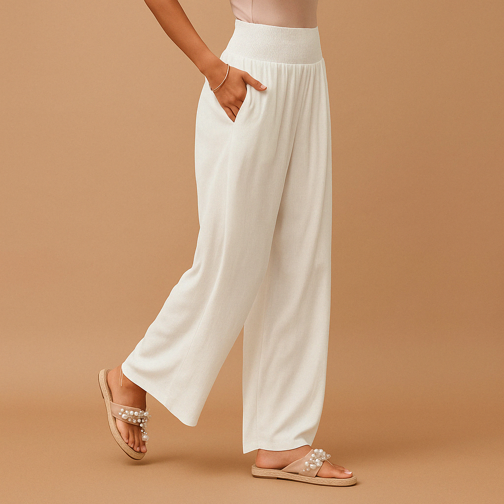Women’s loose summer pants with elastic waistband and wide legs, breathable and lightweight fabric, ideal for warm casual days.
