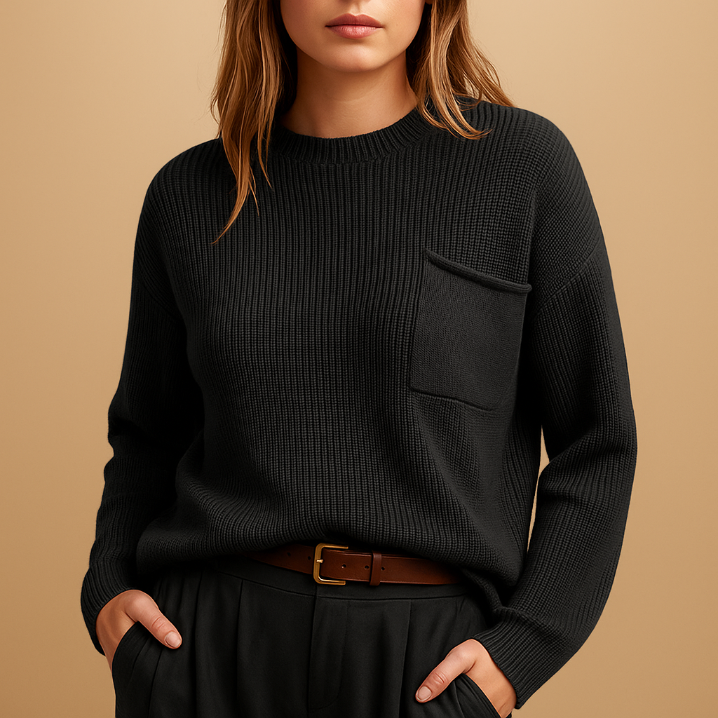 Minimalist knit sweater for women with relaxed fit and sleek silhouette, perfect for pairing with jeans or blouses for casual and office looks.