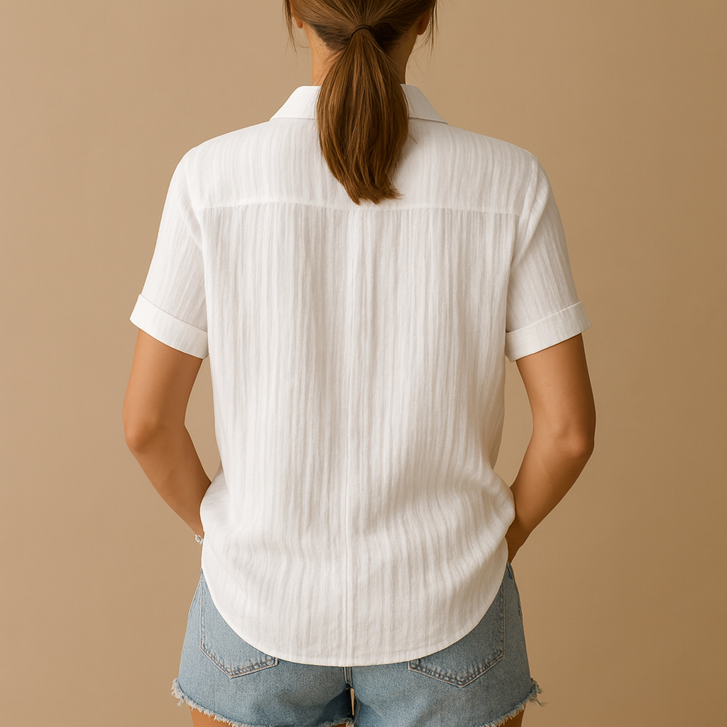 Classic short sleeve blouse for women in white with a relaxed fit and chest pocket, perfect for casual and formal outfits.