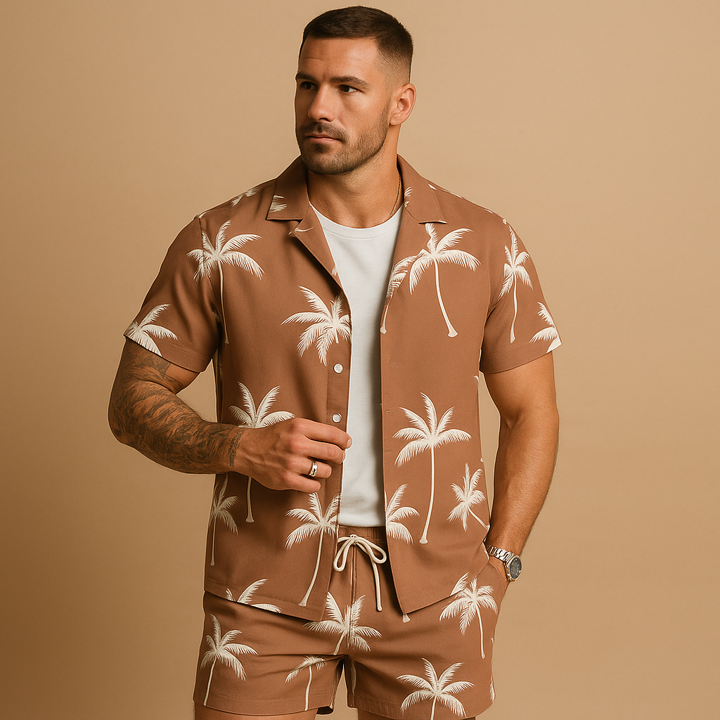 Tropical summer set for men with palm and feather print shirt and shorts, ideal for beach days, vacations, or relaxed summer outings.