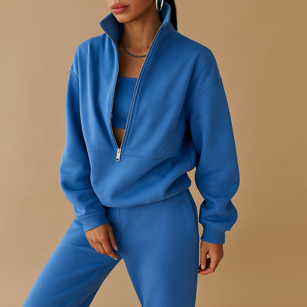 Women’s two-piece tracksuit with half-zip sweatshirt and joggers, perfect for casual days, lounging, or a sporty everyday look.